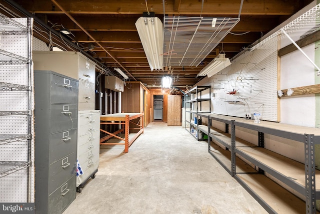 407 Stately Dr, Pasadena, MD 21122 - unfinished basement with a workshop area