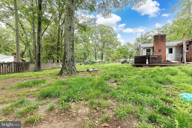 407 Stately Dr, Pasadena, MD 21122 - view of yard featuring a hot tub and fence