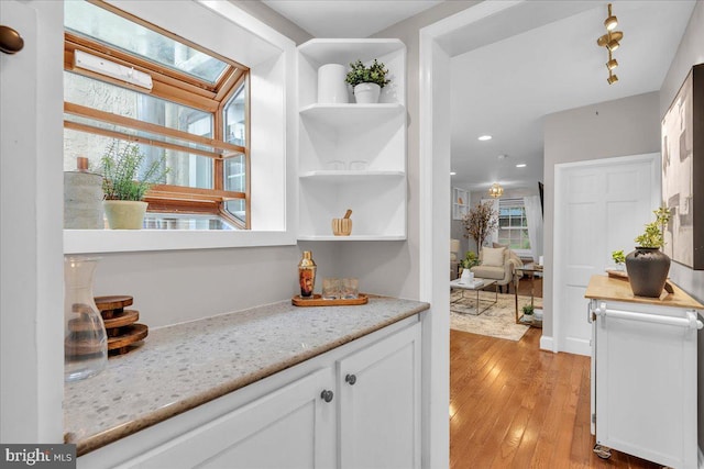 interior space featuring light wood-style floors and recessed lighting