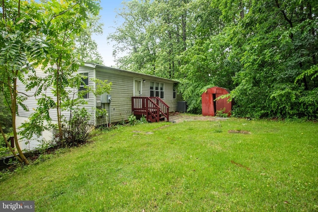 61 Brent Point Rd, Stafford, VA 22554 - view of grassy yard with a shed and an outdoor structure
