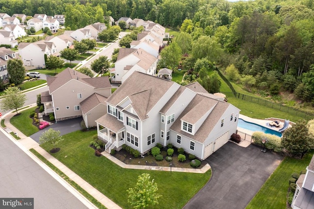 40999 Waxwing Dr, Leesburg, VA 20175 - aerial perspective of suburban area with a pool and a forest