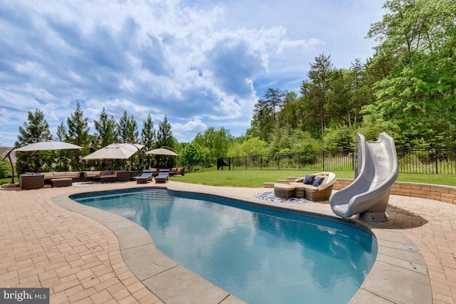 40999 Waxwing Dr, Leesburg, VA 20175 - view of pool featuring outdoor lounge area, a water slide, and a patio