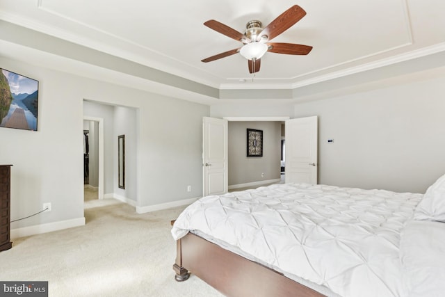 40999 Waxwing Dr, Leesburg, VA 20175 - bedroom with carpet flooring, a tray ceiling, baseboards, crown molding, and a ceiling fan