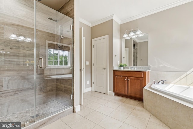 40999 Waxwing Dr, Leesburg, VA 20175 - full bathroom featuring a garden tub, tile patterned floors, crown molding, vanity, and a stall shower