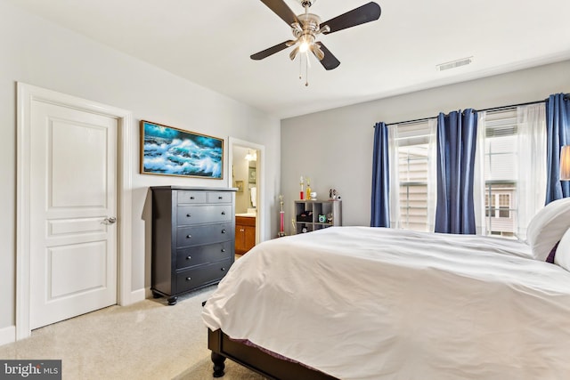 40999 Waxwing Dr, Leesburg, VA 20175 - bedroom featuring carpet, connected bathroom, baseboards, and ceiling fan