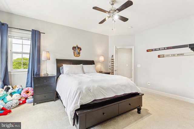 40999 Waxwing Dr, Leesburg, VA 20175 - bedroom with light carpet, baseboards, and ceiling fan