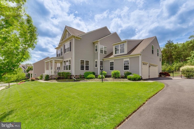 40999 Waxwing Dr, Leesburg, VA 20175 - view of front facade with a garage and asphalt driveway