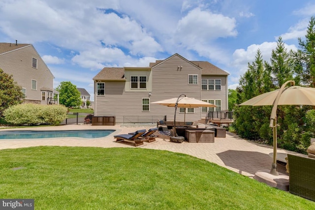 40999 Waxwing Dr, Leesburg, VA 20175 - rear view of property with a patio, an outdoor pool, and outdoor lounge area