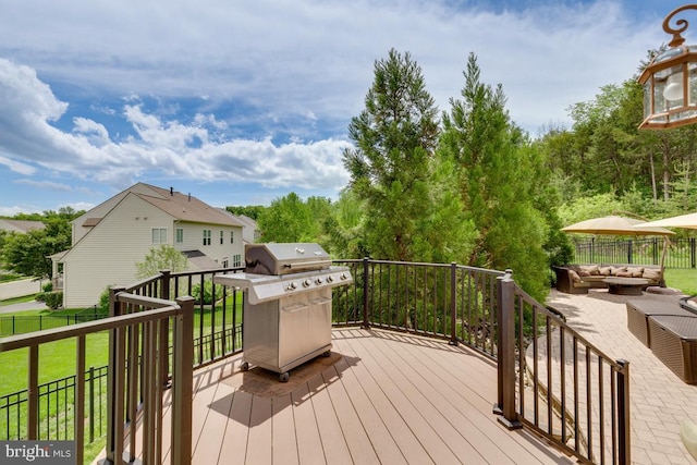 40999 Waxwing Dr, Leesburg, VA 20175 - wooden terrace with outdoor lounge area and a grill