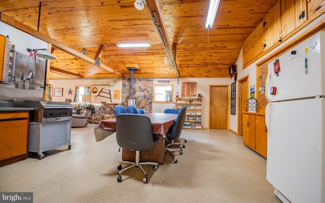 220 Gillens Rd, Mill Hall, PA 17751 - dining space with wood ceiling, a wood stove, rail lighting, and lofted ceiling