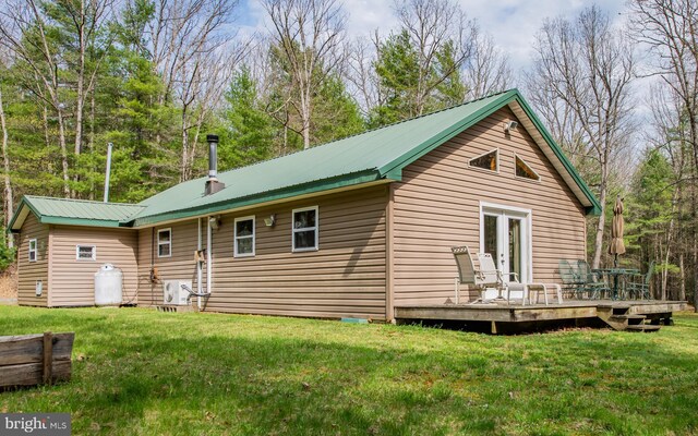 220 Gillens Rd, Mill Hall, PA 17751 - back of house with a deck, french doors, metal roof, and a yard