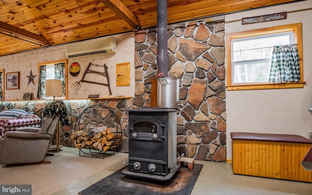 220 Gillens Rd, Mill Hall, PA 17751 - living room with a wood stove, a wall unit AC, wood ceiling, and beamed ceiling