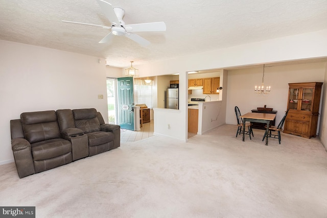 4801 Vesper Cir, Palmyra, NJ 08065 - living area with a chandelier, light carpet, a ceiling fan, and a textured ceiling