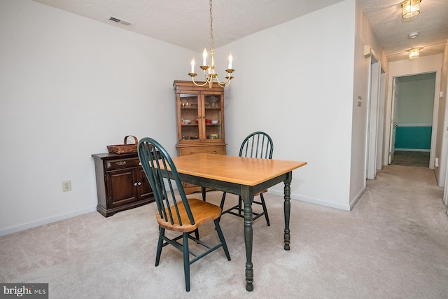 4801 Vesper Cir, Palmyra, NJ 08065 - dining room featuring a chandelier, light carpet, a textured ceiling, and baseboards