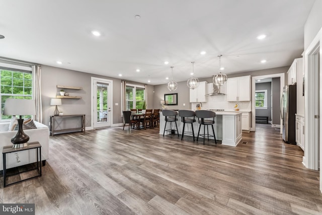 803 Rexford Way, Upper Marlboro, MD 20774 - kitchen featuring recessed lighting, healthy amount of natural light, white cabinets, and an island with sink