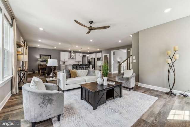 803 Rexford Way, Upper Marlboro, MD 20774 - living room with wood finished floors, baseboards, ceiling fan, recessed lighting, and stairway
