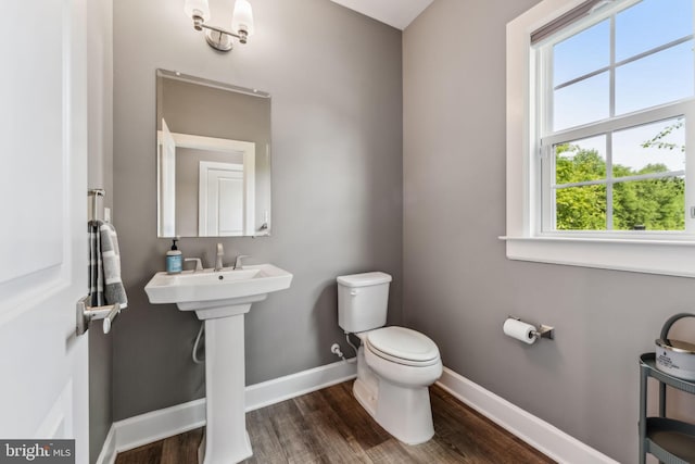 803 Rexford Way, Upper Marlboro, MD 20774 - bathroom featuring wood finished floors, toilet, and baseboards