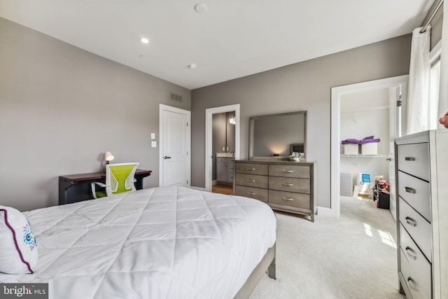 803 Rexford Way, Upper Marlboro, MD 20774 - bedroom featuring a walk in closet, light carpet, baseboards, and a closet