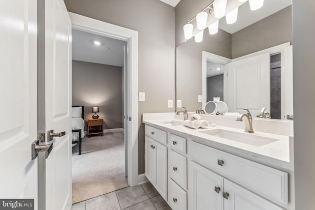 803 Rexford Way, Upper Marlboro, MD 20774 - ensuite bathroom with double vanity, tile patterned flooring, and baseboards