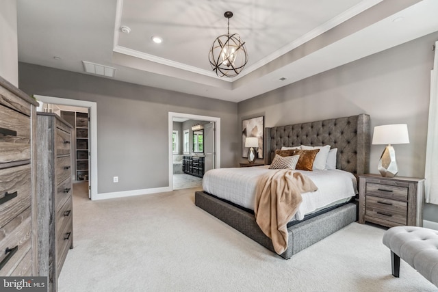 803 Rexford Way, Upper Marlboro, MD 20774 - carpeted bedroom with ornamental molding, a raised ceiling, baseboards, a spacious closet, and a chandelier