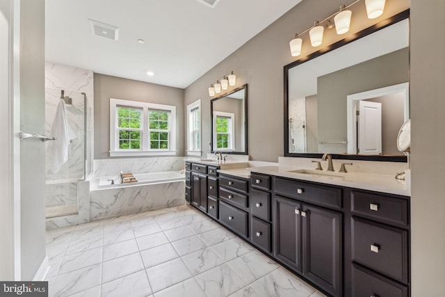 803 Rexford Way, Upper Marlboro, MD 20774 - bathroom with marble look tiles, a garden tub, double vanity, a marble finish shower, and recessed lighting
