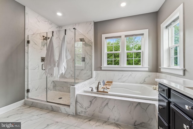 803 Rexford Way, Upper Marlboro, MD 20774 - bathroom featuring healthy amount of natural light, a marble finish shower, a garden tub, and recessed lighting