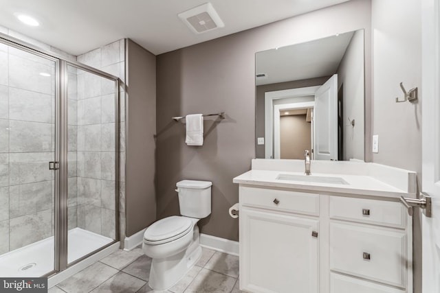 803 Rexford Way, Upper Marlboro, MD 20774 - bathroom with a shower stall, toilet, vanity, tile patterned flooring, and baseboards