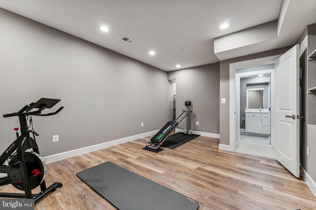 803 Rexford Way, Upper Marlboro, MD 20774 - workout room with light wood-style floors, baseboards, and recessed lighting