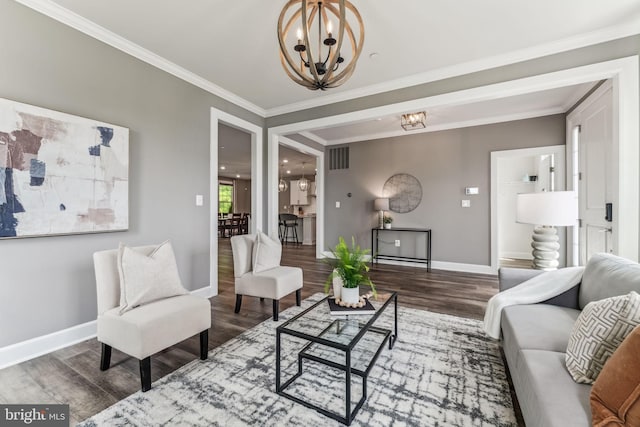 803 Rexford Way, Upper Marlboro, MD 20774 - living room with a chandelier, wood finished floors, ornamental molding, and baseboards