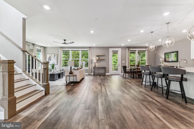 803 Rexford Way, Upper Marlboro, MD 20774 - living area with recessed lighting, wood finished floors, stairs, ceiling fan, and a chandelier