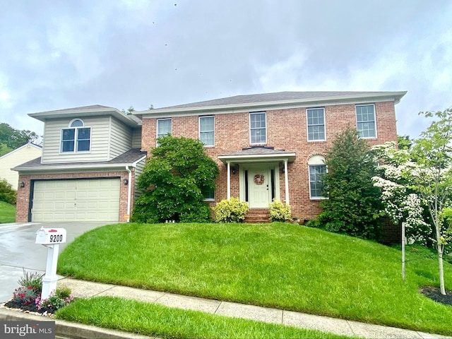 9200 Hines Meadow Way, Baltimore, MD 21234 - view of front of home featuring concrete driveway, brick siding, an attached garage, and a front yard