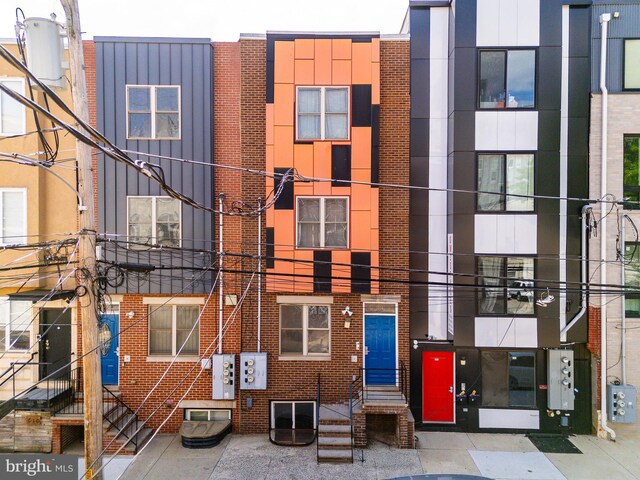 view of building exterior featuring entry steps