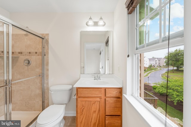 107 Bancroft Dr Unit 96, Fredericksburg, VA 22405 - full bathroom featuring toilet, vanity, a stall shower, and tile patterned floors
