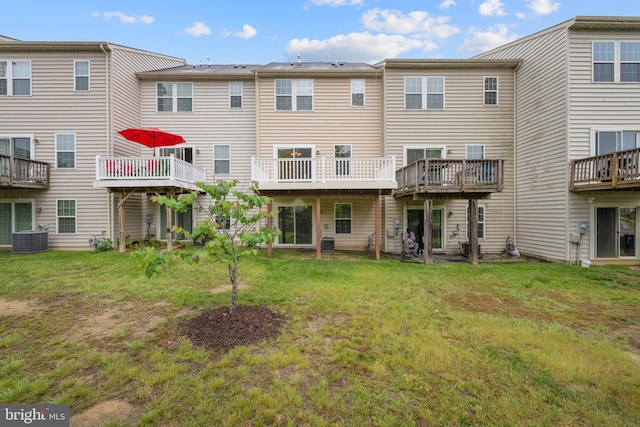 107 Bancroft Dr Unit 96, Fredericksburg, VA 22405 - rear view of house with cooling unit and a yard