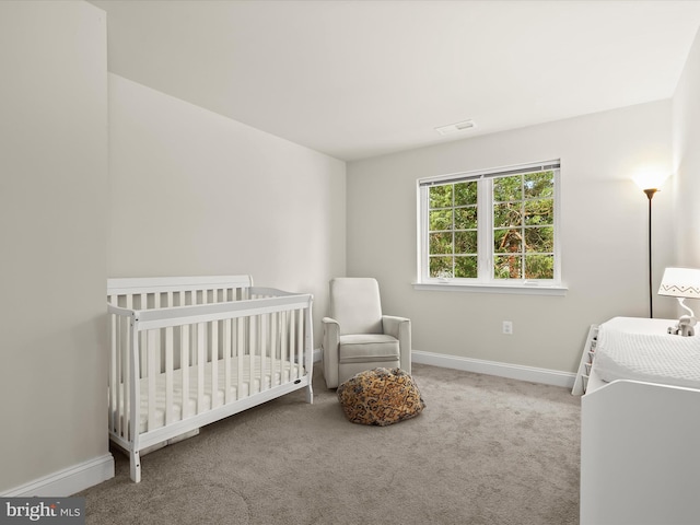 300 Grace Way, Laurel, MD 20707 - bedroom with baseboards, carpet flooring, and a crib
