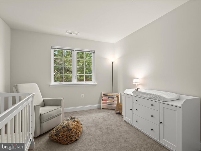 300 Grace Way, Laurel, MD 20707 - bedroom featuring carpet floors, baseboards, and a nursery area
