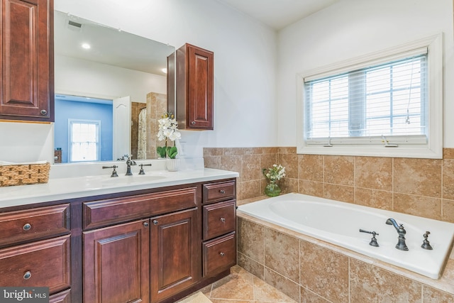 8200 Marshall Corner Rd, Pomfret, MD 20675 - full bath featuring a garden tub, vanity, and tile patterned flooring