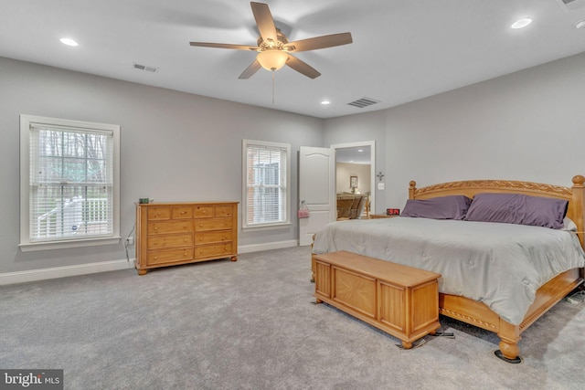 8200 Marshall Corner Rd, Pomfret, MD 20675 - bedroom with multiple windows, light colored carpet, baseboards, recessed lighting, and ceiling fan