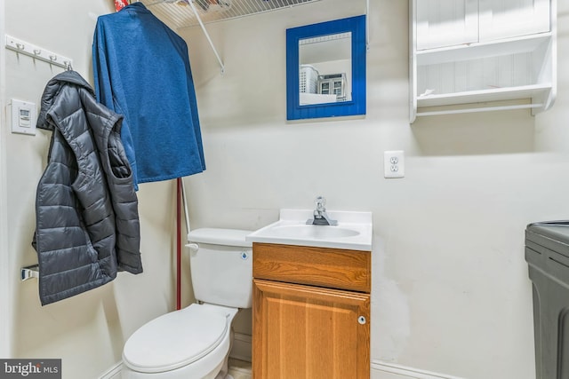 8200 Marshall Corner Rd, Pomfret, MD 20675 - half bath featuring toilet, vanity, and washer / clothes dryer