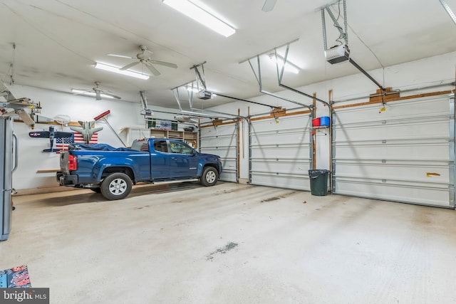 8200 Marshall Corner Rd, Pomfret, MD 20675 - garage with a garage door opener, a ceiling fan, and freestanding refrigerator