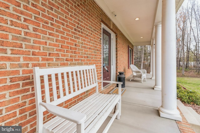 8200 Marshall Corner Rd, Pomfret, MD 20675 - view of patio featuring covered porch