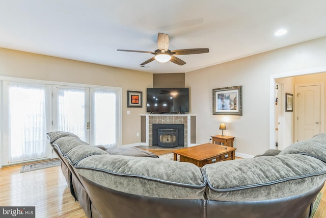 8200 Marshall Corner Rd, Pomfret, MD 20675 - living room with ceiling fan, baseboards, and light wood-type flooring