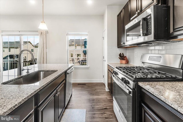10732 Lamoka Ln, New Market, MD 21774 - kitchen featuring appliances with stainless steel finishes, a sink, baseboards, dark wood-style floors, and decorative backsplash