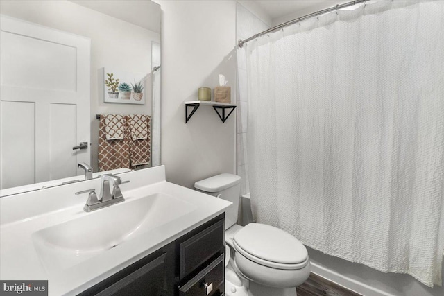 10732 Lamoka Ln, New Market, MD 21774 - bathroom featuring toilet, shower / bath combination with curtain, vanity, and wood finished floors