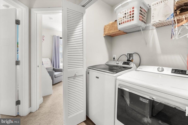 10732 Lamoka Ln, New Market, MD 21774 - laundry area with independent washer and dryer and light carpet