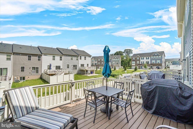 10732 Lamoka Ln, New Market, MD 21774 - wooden terrace with a residential view, a grill, and outdoor dining space