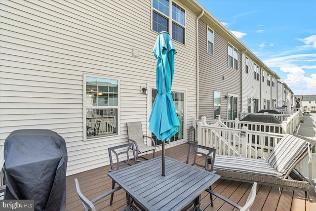 10732 Lamoka Ln, New Market, MD 21774 - wooden deck featuring a grill and outdoor dining space