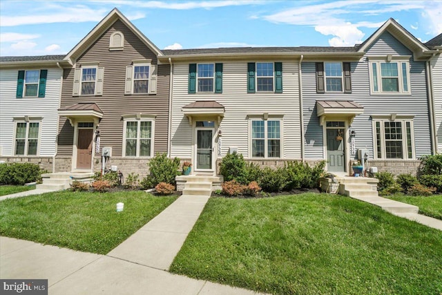 10732 Lamoka Ln, New Market, MD 21774 - townhome / multi-family property featuring a front yard and stone siding
