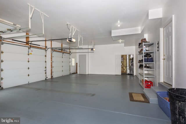 garage featuring a garage door opener