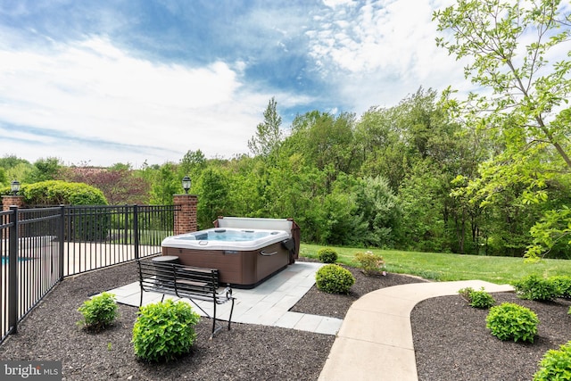 view of patio / terrace featuring a hot tub